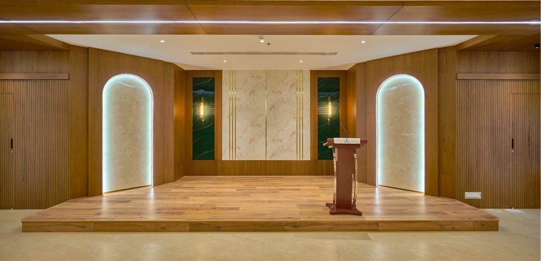 Event stage with podium and decorative wall panels