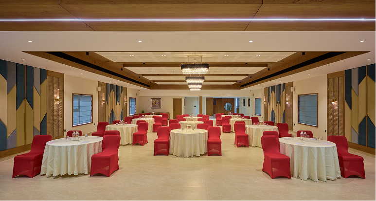 Banquet chairs and patterned wall detail
