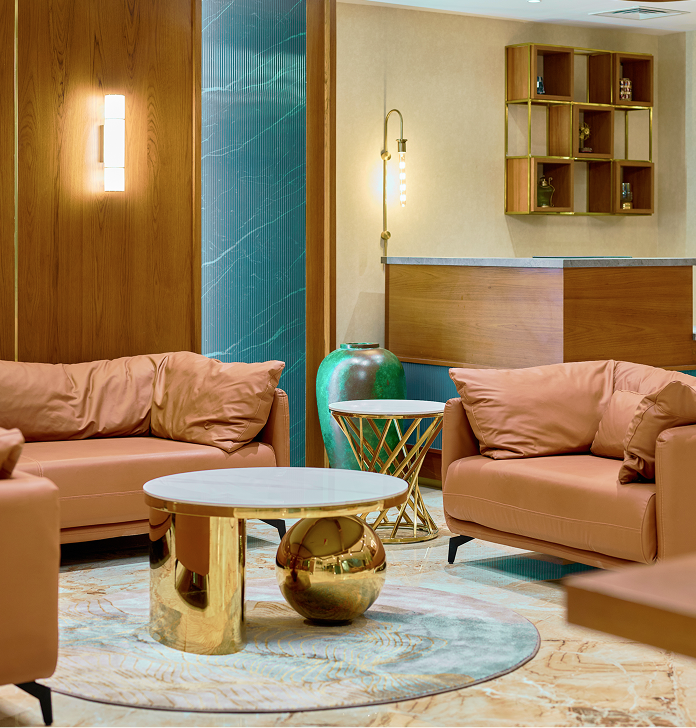 Hotel lounge seating area with neutral lighting